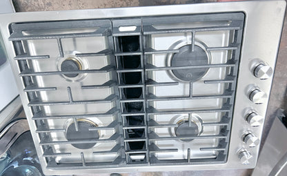 30 Inch JennAir Euro-Style Series  JGD3430GS  Gas Cooktop 4 Sealed Burners, Continuous Grates, 17,000 BTU Ultra-High Output Burner, 5,000 BTU Ultra-Low Output Burner, 3-Speeds, JX3 Downdraft Ventilation System, Prop 65, ADA Compliant, UL Certified, 373735