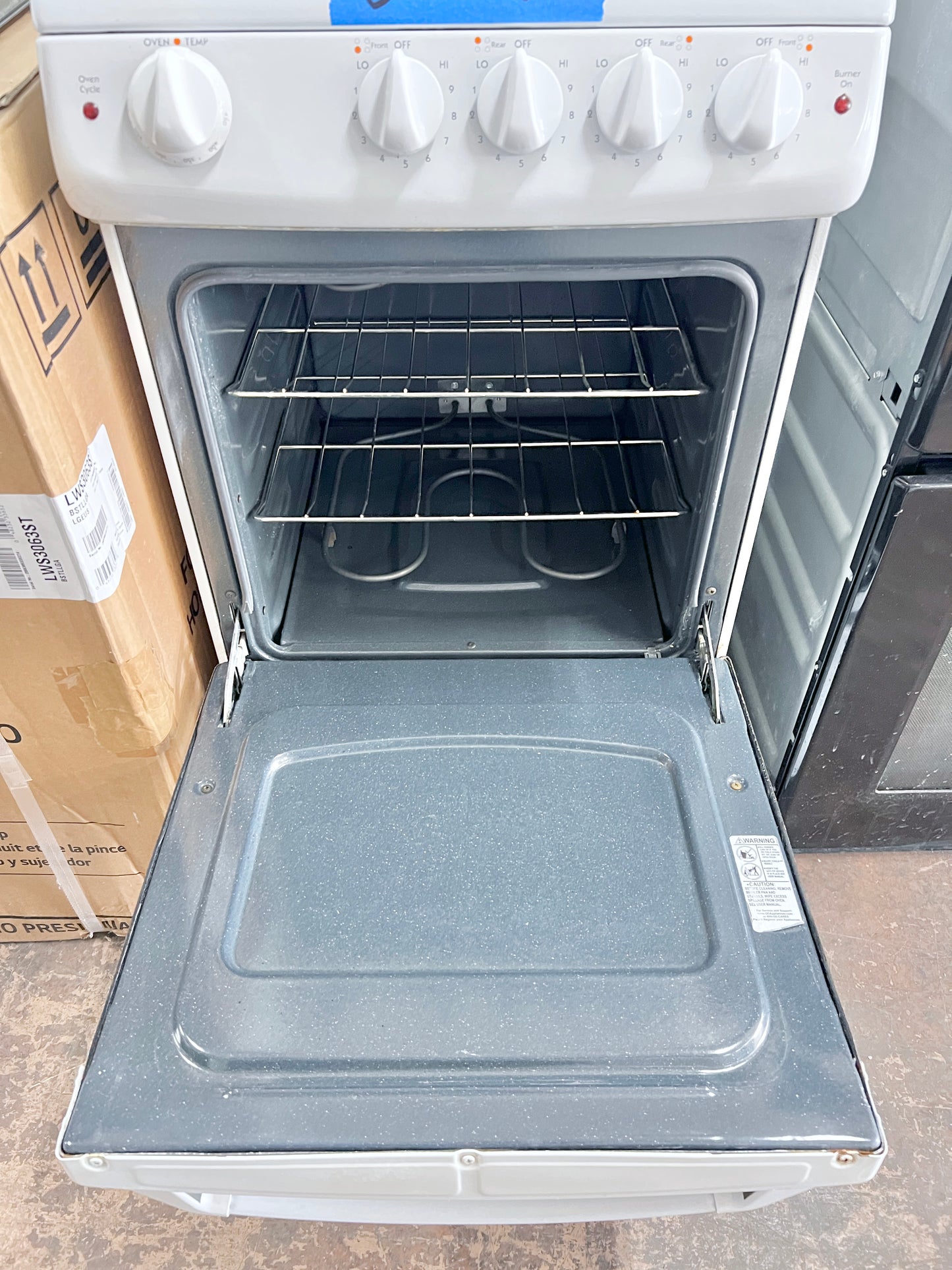 Hotpoint 20 inch Electric Range , 4 Coil Elements Burners , Bake Broil Oven , White , 373756 .