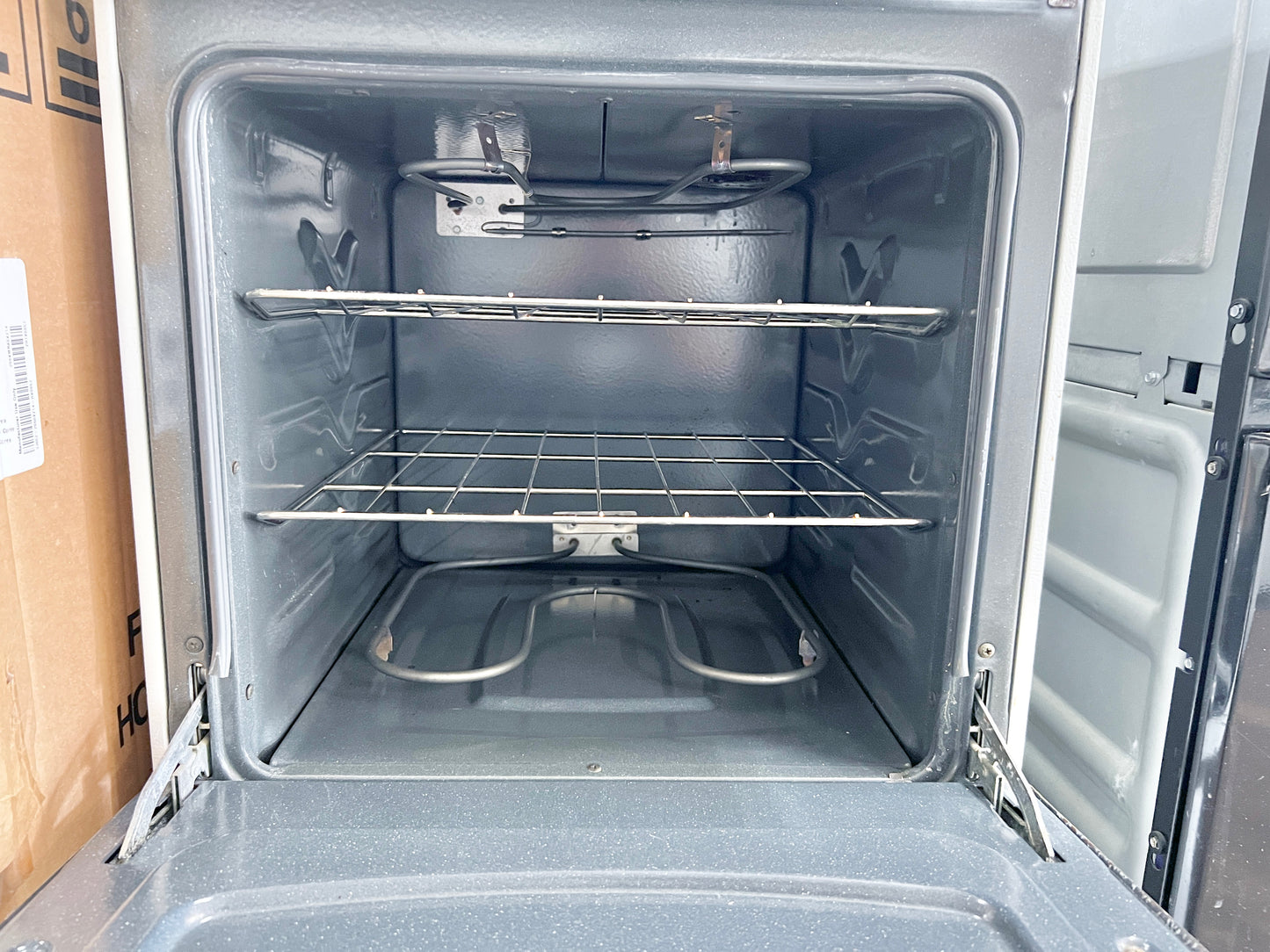 Hotpoint 20 inch Electric Range , 4 Coil Elements Burners , Bake Broil Oven , White , 373756 .