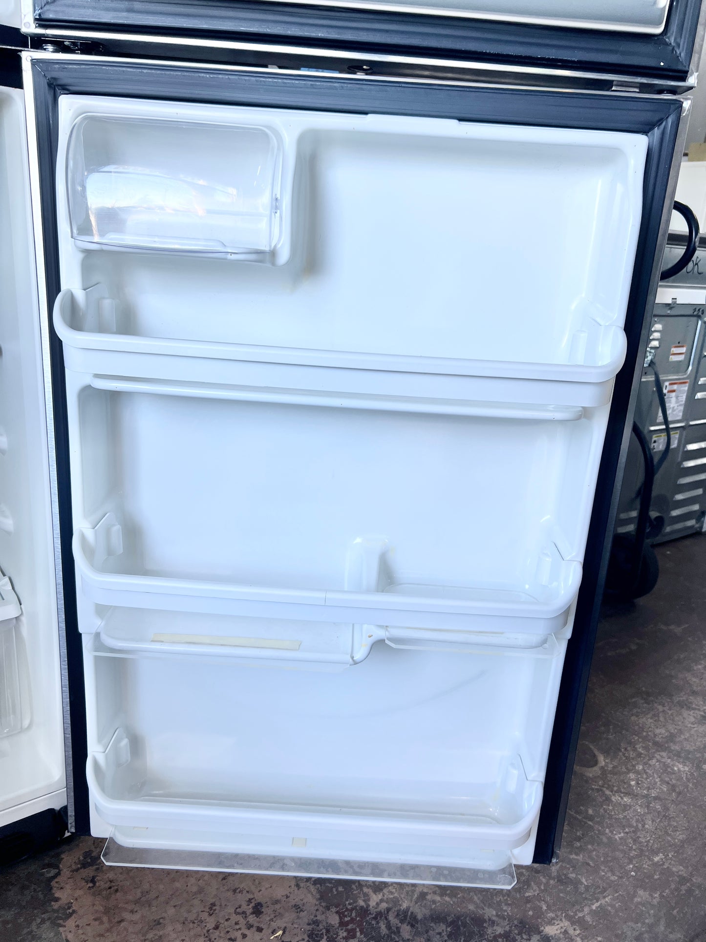 Frigidaire  FFTR2021TS 30 Inch Top Freezer Refrigerator 20.4 cu. ft., Full-Width Freezer Shelf, Reversible Door, Stainless Steel , 373759