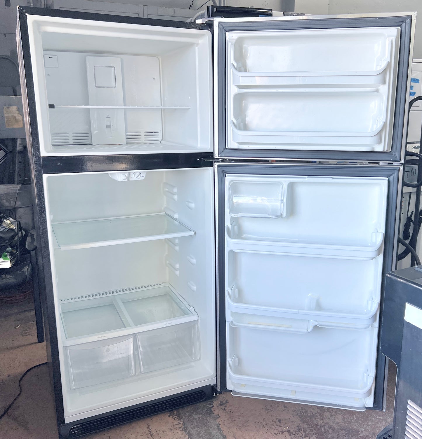 Frigidaire  FFTR2021TS 30 Inch Top Freezer Refrigerator 20.4 cu. ft., Full-Width Freezer Shelf, Reversible Door, Stainless Steel , 373759