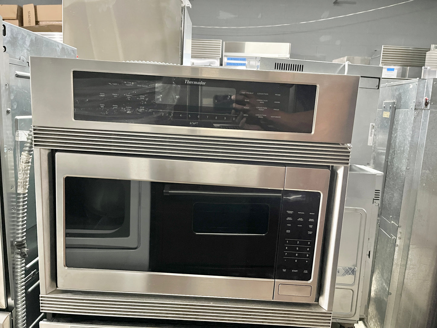 Thermador Combination SE-Series SEM272BP 27 Inch Combination Flat Front Wall Oven Integrated 1100-Watt Microwave, Advanced Third Element Convection in Lower Oven & Extra-Large Oven Stainless Steel w/ Professional Handle 369561