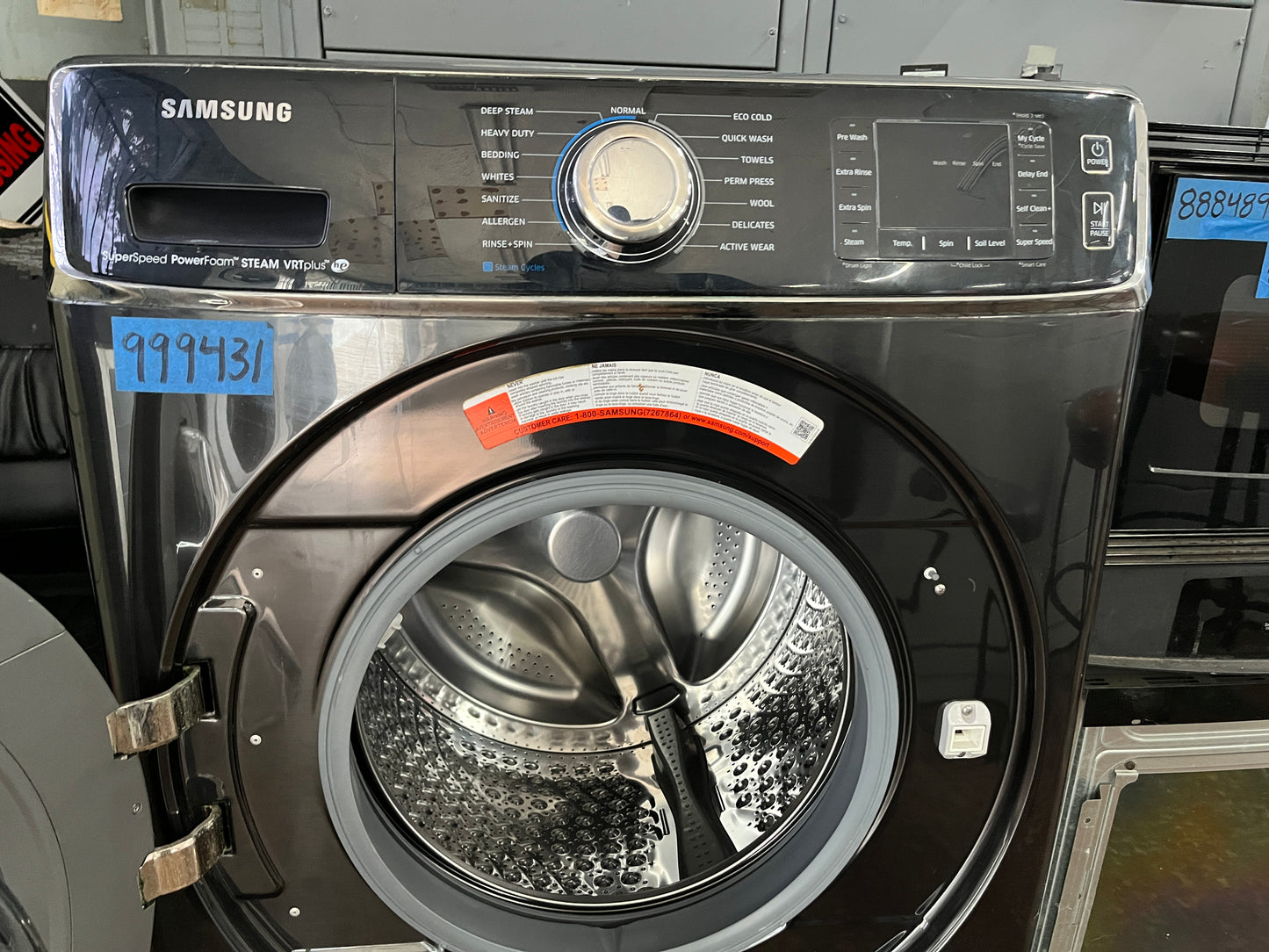 Samsung  WF56H9100AW 30 Inch 5.6 cu. ft. Front Load Washer, 1,300 RPM, Steam, Super Speed, Power Foam, Sanitize Cycle, Vibration Reduction Plus, Smart Care, Self Clean, energy star , Black Stainless Steel , 999431