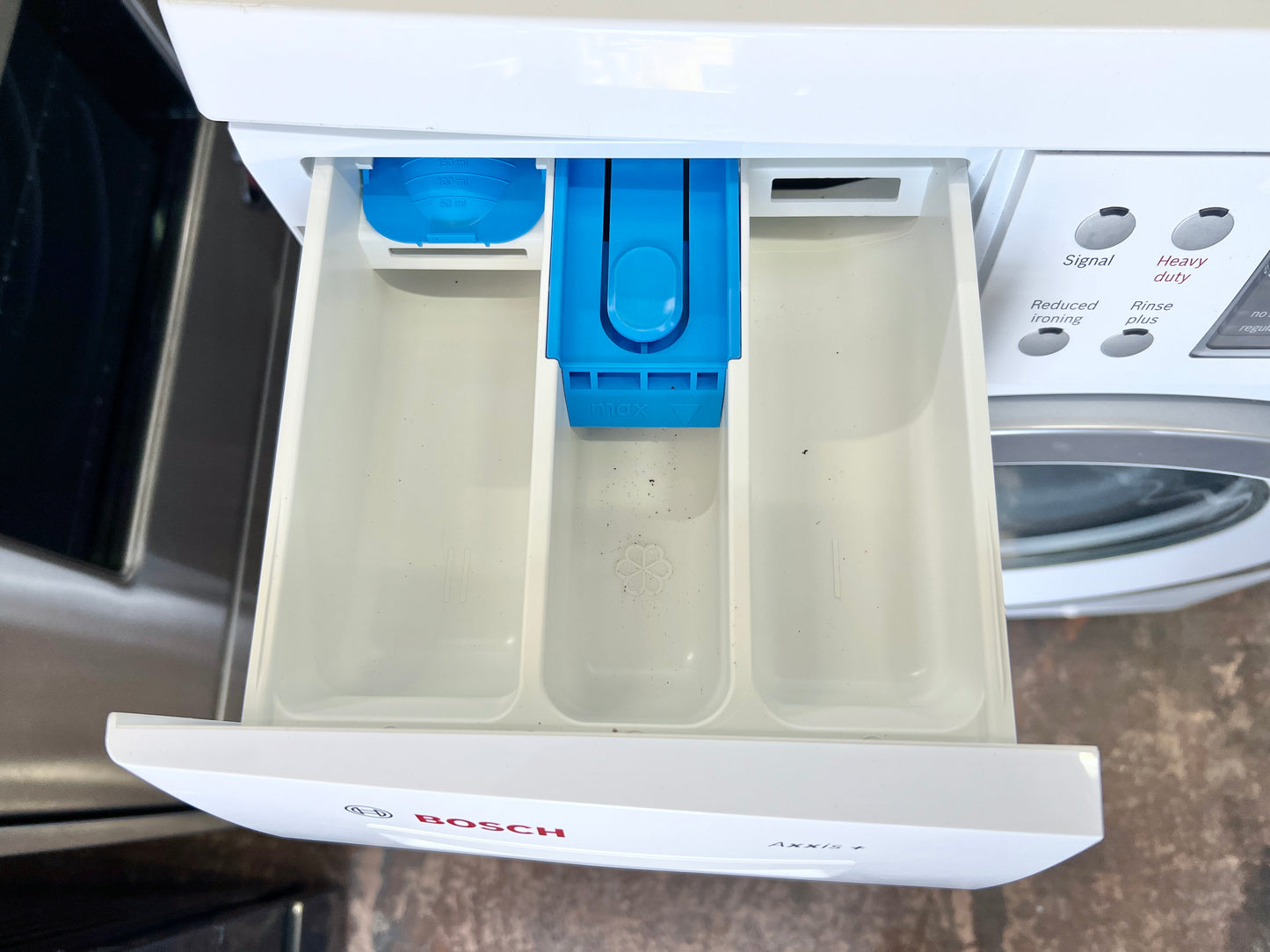 24 Inch Bosch Axxis Plus Series  WAS24460UC Compact Front Load Stackable Washer , 2.2 cu. ft. Capacity, 15 Wash Programs, Energy Consumption of 130 kWH/year, Touch Controls & LED Display 1,200 RPM Spin Speed , 444389