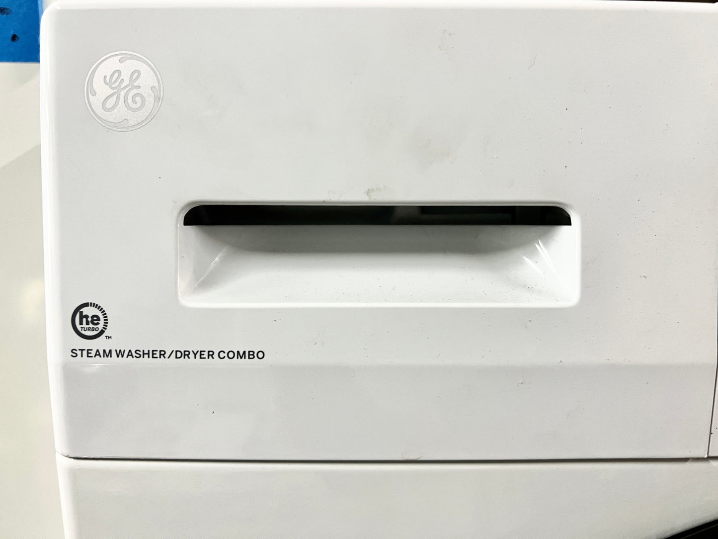 GE  GFQ14ESSNWW 24 Inch Front Load Electric Washer/Dryer Combo with 2.4 cu. ft Capacity, 14 Cycle Options, 5 Heat Selections, 1,450 RPM Spin Speed, NSF Sanitize, Timed Dry, Steam, 24 Hour Delay Start and Optional Wi-Fi Connect , 444182