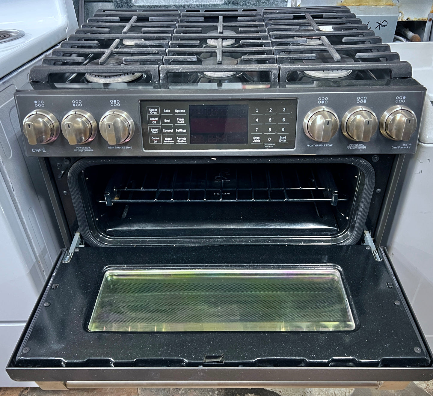 GE Cafe Series 30 Inch  CGS995EELDS Slide In 6 Burner Gas Range , Double Oven, WiFi Connect, Tri-Ring Burner, Oven Meat Probe, Cast Iron Griddle, Convection, Chef Connect, Star-K, ADA and 6.7 cu. ft. Black Slate , 444460